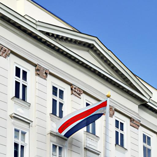 Tòa nhà chính phủ với lá cờ quốc gia phấp phới trước mặt