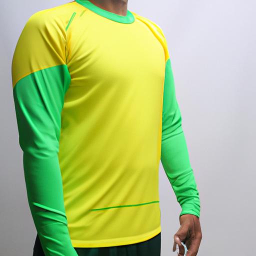 Trang phục thể thao nam với màu xanh ngọc và vàng